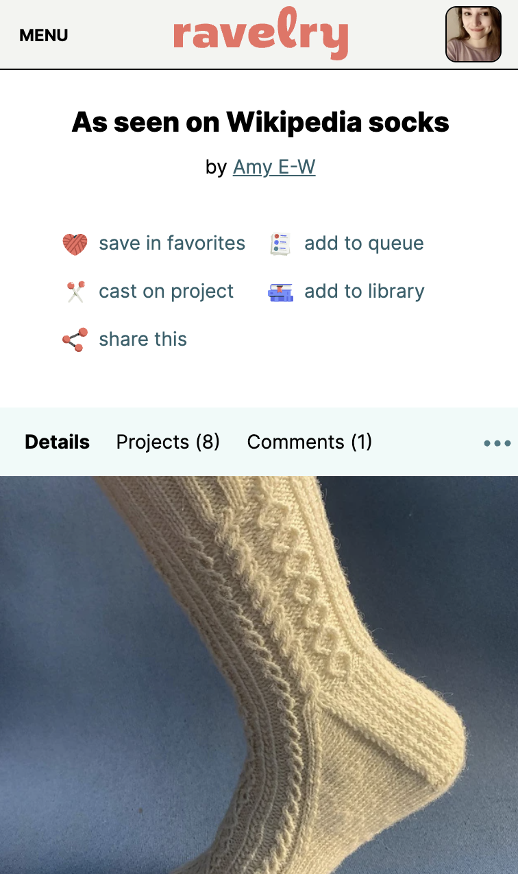 "As seen on Wikipedia socks"<br>Photo: a handknit sock in lightweight cream colored yarn with a variety of vertical cables